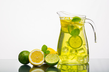 Lemonade pitcher with lemon