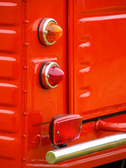 rear lights, indicator and bumper of a vintage car