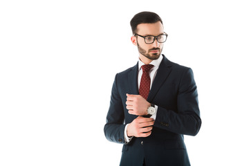 handsome businessman in black suit and glasses looking away isolated on white