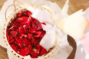 Beautiful red Rose petals Flowers in basket decorated in wedding ceremony