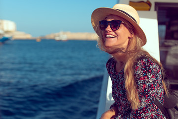 Happy mediterranean woman amazed by panorama on cruise ship - obrazy, fototapety, plakaty
