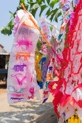 Fototapeta na wymiar Colorful paper flags or tung for songkran festival at the temple in chiang mai 