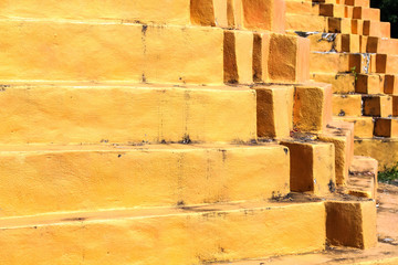 Golden pagoda detail is "Mon" architectural style at temple located in Kanchanaburi Province, Thailand.