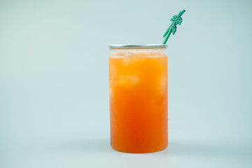 Plastic glass of iced peach soda