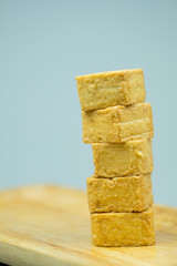 Tofu fish in wooden tray