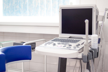 Ultrasound scanner equipmentin in clinic hospital. Diagnostics, sonography and health concept. Copyspace