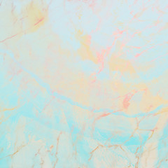 Marble with natural mother of pearl in yellow and  turquoise colors. Multicolored marble.