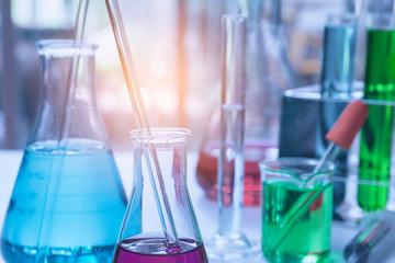 Glass laboratory chemical test tubes with liquid for analytical , medical, pharmaceutical and scientific research concept.