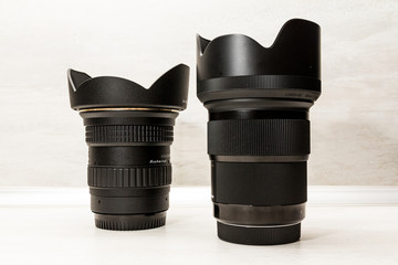 set of camera lens on wooden background