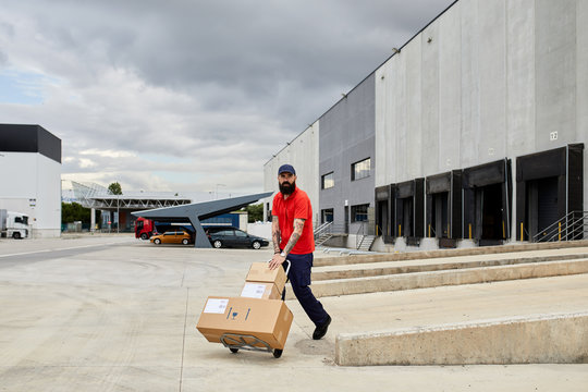 Packman transporting packages on the cart.
