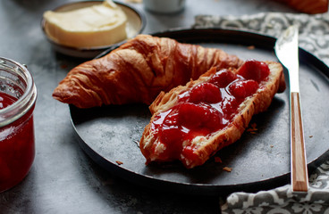 Croissant and strawberry jam