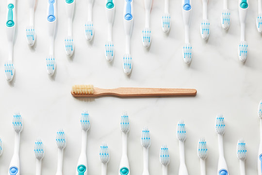 Alternative bamboo toothbrush versus plastic.