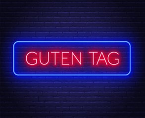 Neon sign of word Guten Tag in frame on dark background. Greetings in German. Light banner on the wall background.