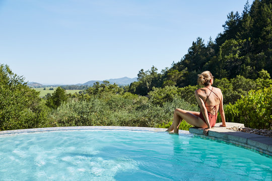 Mature woman relaxing at spa pool