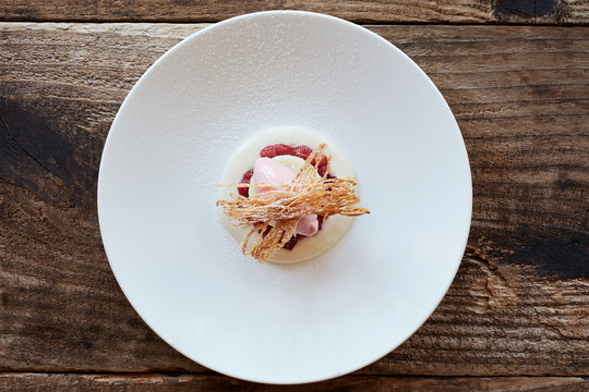 Gourmet dessert with rhubarb and cake
