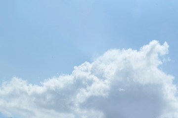 bright blue sky with a gentle cloud