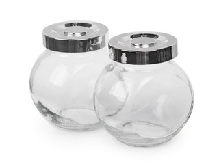 Two small empty glass jars isolated
