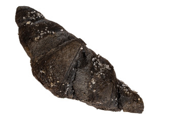 Charcoal croissant, isolated on white. Black colour due to vegetable carbon aka carbo medicinalis vegetabilis.