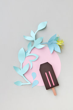 Handmade chocolate ice cream origami cut of paper with flowers a