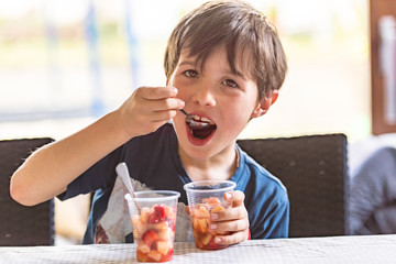 Child eating fruit