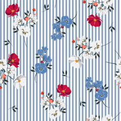 Obraz premium Trendy full of blooming flowers and leaves bright mood on light blue stripe seamless pattern