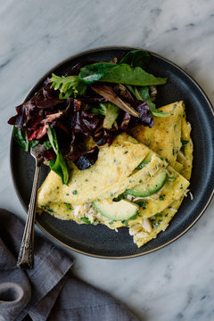 Crab Omelet with Avocado and herbs