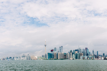 Toronto skyline and waterfront as lake fog and low cloud clear