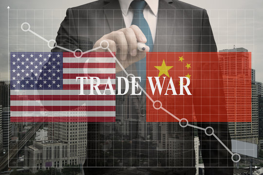 Double exposure of Businessman , trade war between the biggest economies, us and china make the world be economic crisis concept