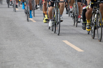 Naklejka na ściany i meble Cycling competition,rides a bike on asphalt road. 