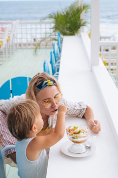 Mother With Son At Cafe Ib Summer Vacation