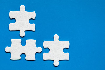 Closeup of jigsaw puzzle isolated. Missing jigsaw puzzle piece, business concept for completing the...