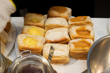 Hot bread with many kind of source inside such as red bean, egg roll ready to sell, Thai Style sweet dessert for Street Food