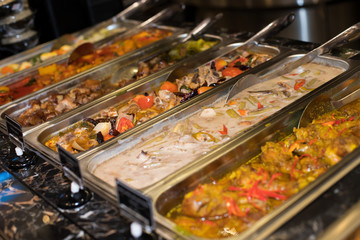 Deep Fried Fish Three Favor Souce, and many Thai Spicy Food in Buffet Catering Plate ready to eat, group meeting, conference for lunch and dinner, selective focus
