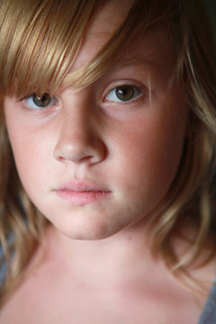 Portrait of Pre-teen Girl With Brown Eyes