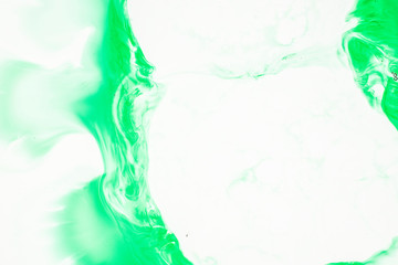 Watercolor and acrylic abstract. Colorful background. Mix, splashes and drawings of colors: green, white background