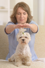 Woman practicing reiki therapy