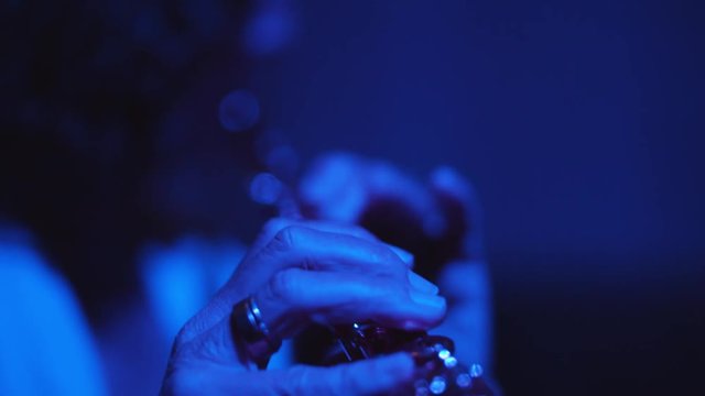 woman playing the transverse flute vividly
