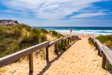 View of the Monte Clerigo beach on the western coastline of Portugal, Algarve. Stairs to beach Praia Monte Clerigo near Aljezur, Costa Vicentina, Portugal, Europe.