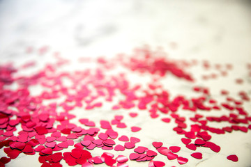 Heart Shaped Glitter Confetti on a Marble Slab