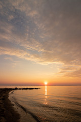 idyllic seaside scene, burial at sea, obituary, condolences