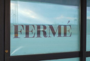 french closed sign bankruptcy business door showcase 