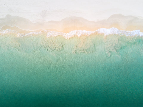 Water Breaking On A Beach From Above