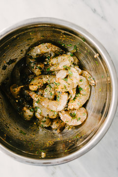Marinated Shrimp in a stainless steel bowl