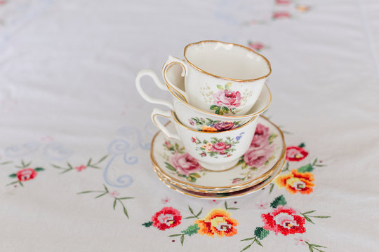 Vintage teacups and tablecloth