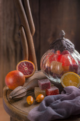Handmade multi fruit marmalade. On wooden background.