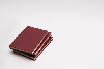 books with red cover on white background, isolated. back to school