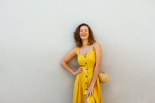 Beautiful Woman Wearing Yellow Dress.
