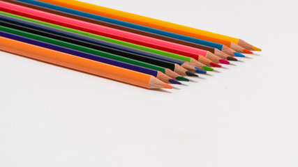 set of colored pencils on a white background, isolated. back to school