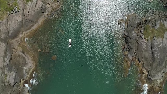 Aerial view of the people on the boat in the Island. Video recorded in Vila Velha, Espirito Santo, 2019.