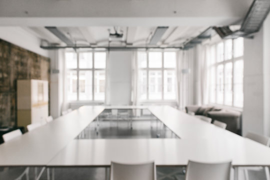 Bright White Industrial Conference Room Defocused